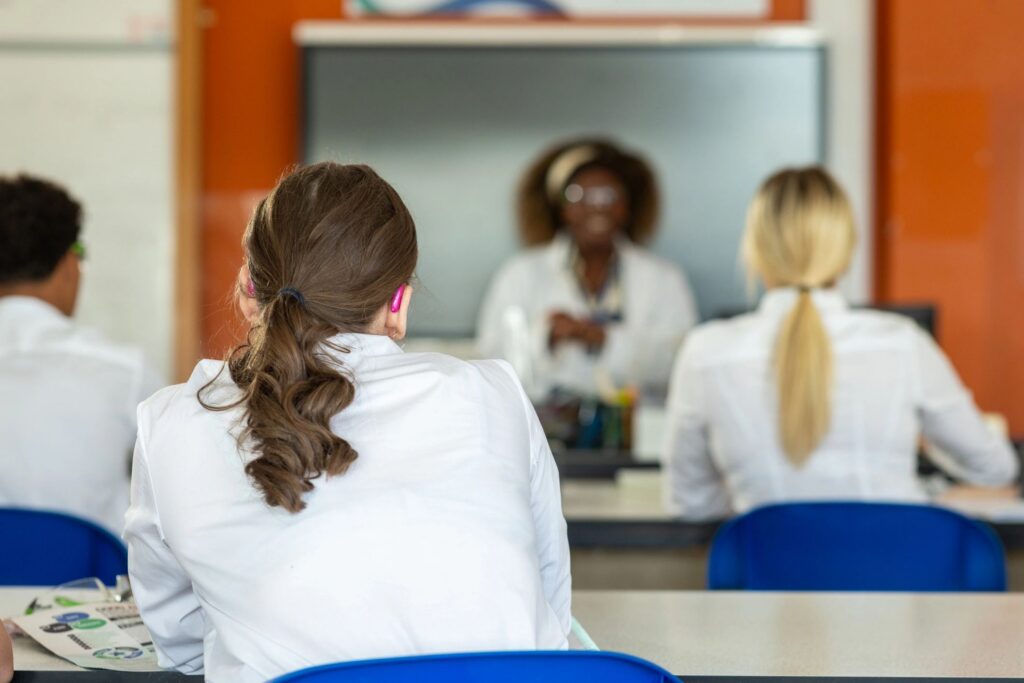 Student with Hearing Aids Listening in Class